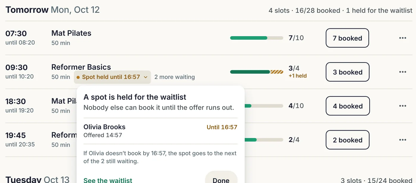 The Slots list in the GettingBooked admin. Reformer Basics shows Spot held until 16:57 and 2 more waiting; a panel explains the spot is held for Olivia Brooks, offered at 14:57, and will go to the next of the 2 still waiting if she does not book by 16:57.